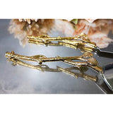 2 Piece Gold-leaf (twig) Cake Server Set. 1 Cake Knife and 1 Cake Server. Leaf Design 2 Tone Made of Stainless Steel and Brass. Ideal for Weddings, Party's, Elegant Events.